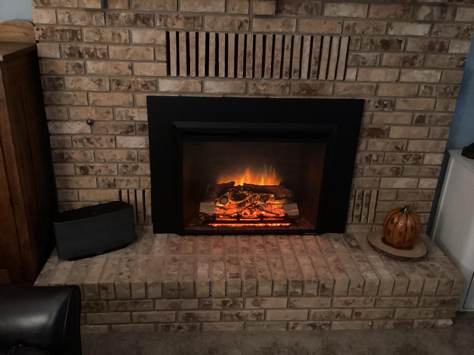 PuraFlame Western Electric Fireplace Insert with Fire Crackling Sound, Remote Control, 750/1500W, Black, 33 1/16 Inches Wide, 25 9/16 Inches High Customer Review PuraFlame Western Electric Fireplace Insert with Fire Crackling Sound, Remote Control, 750/1500W, Black, 33 1/16 Inches Wide, 25 9/16 Inches High - Customer Photo 1