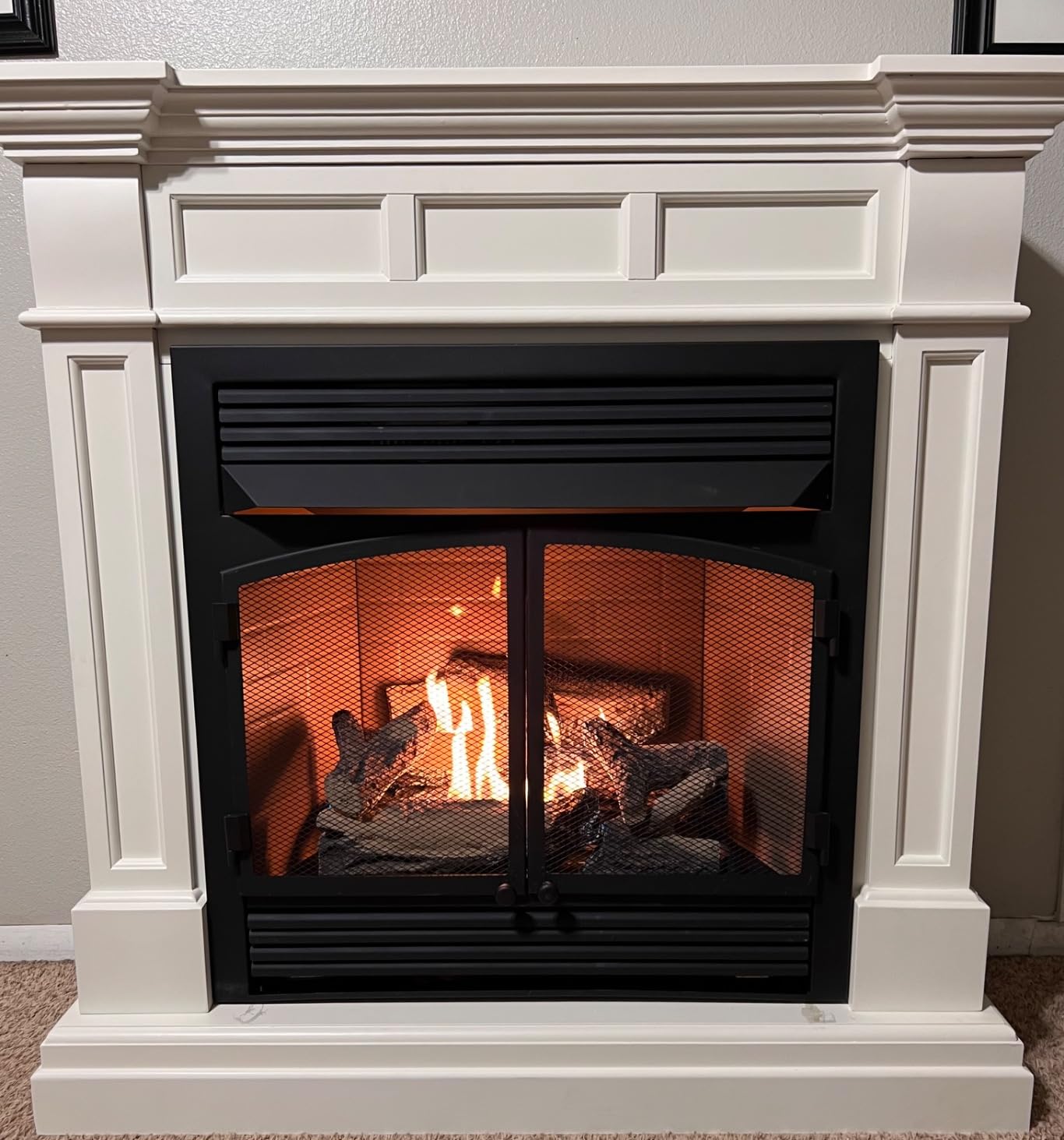 Duluth Forge Dual Fuel Ventless Gas Fireplace System with Mantle, Remote Control, 6 Fire Logs, Use with Natural Gas or Liquid Propane, 32000 BTU, Heats up to 1500 Sq. Ft., Antique White Customer Review Duluth Forge Dual Fuel Ventless Gas Fireplace System with Mantle, Remote Control, 6 Fire Logs, Use with Natural Gas or Liquid Propane, 32000 BTU, Heats up to 1500 Sq. Ft., Antique White - Customer Photo 2
