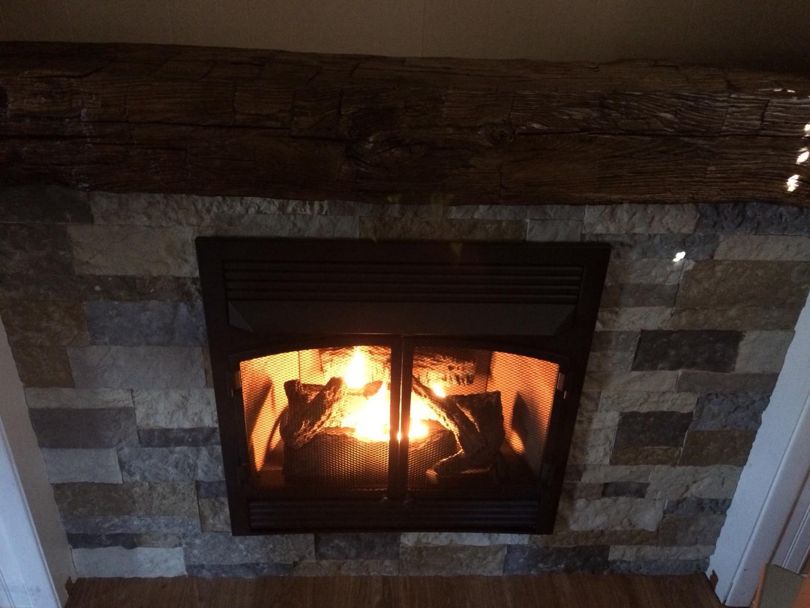 Duluth Forge Dual Fuel Ventless Gas Fireplace Insert, Remote Control, 6 Fire Logs, Use with Natural Gas or Liquid Propane, 32000 BTU, Heats up to 1500 Sq. Ft., Black Customer Review Duluth Forge Dual Fuel Ventless Gas Fireplace Insert, Remote Control, 6 Fire Logs, Use with Natural Gas or Liquid Propane, 32000 BTU, Heats up to 1500 Sq. Ft., Black - Customer Photo 1