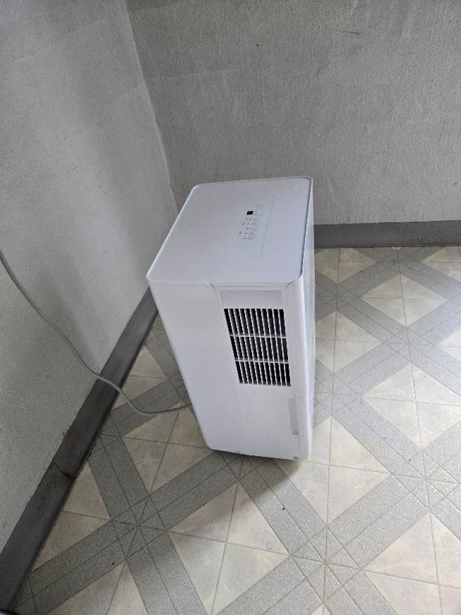 Amazon Basics Large Dehumidifier for Rooms, Energy Star Certified, Effectively Reduces Humidity, With Continuous Drain Pump, Timer, Auto-Defrost, Overflow Protection, up to 4000 SFT, 50 Pint, White - Customer Photo 1