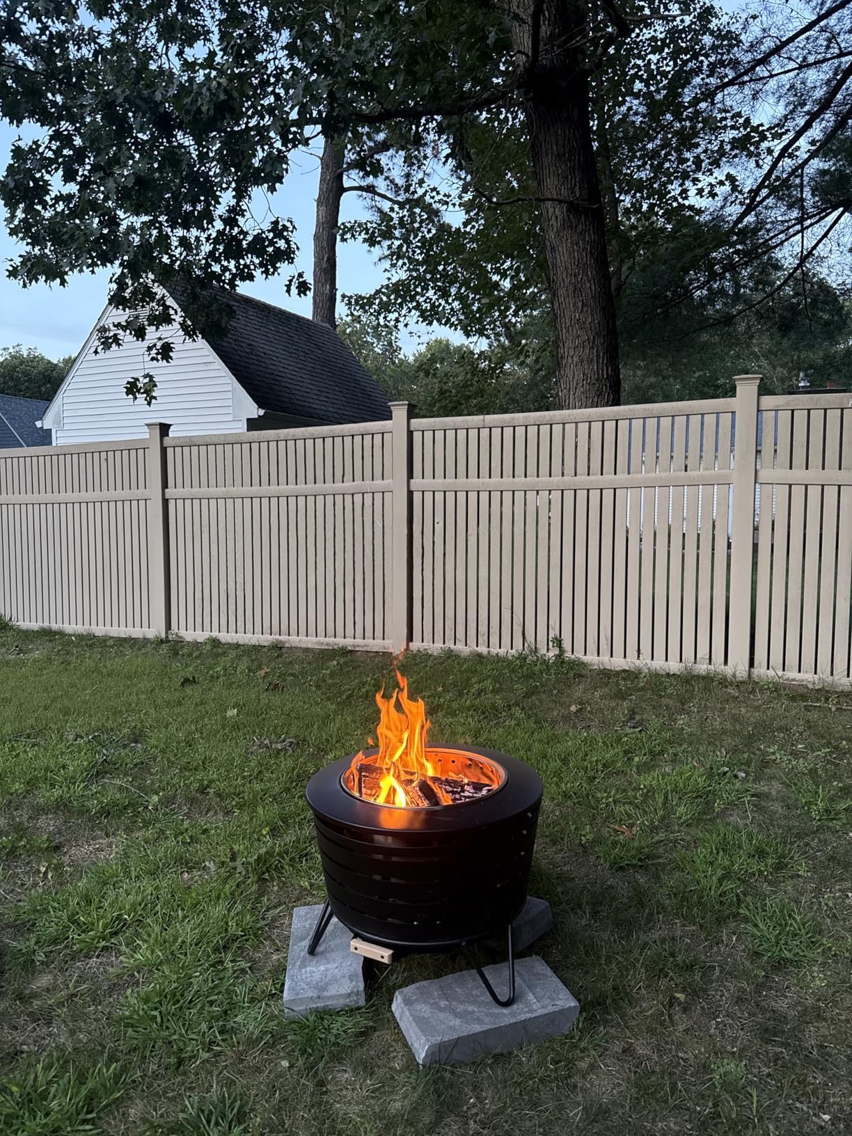 TIKI Patio Fire Pit Bundle – 25-Inch Smokeless Wood Burning Outdoor Fire Pit for Backyard, Patio, Deck & Garden with Removable Ash Pan, Stand & Weather-Resistant Cover – Modern Black Stainless Steel - Customer Photo 1