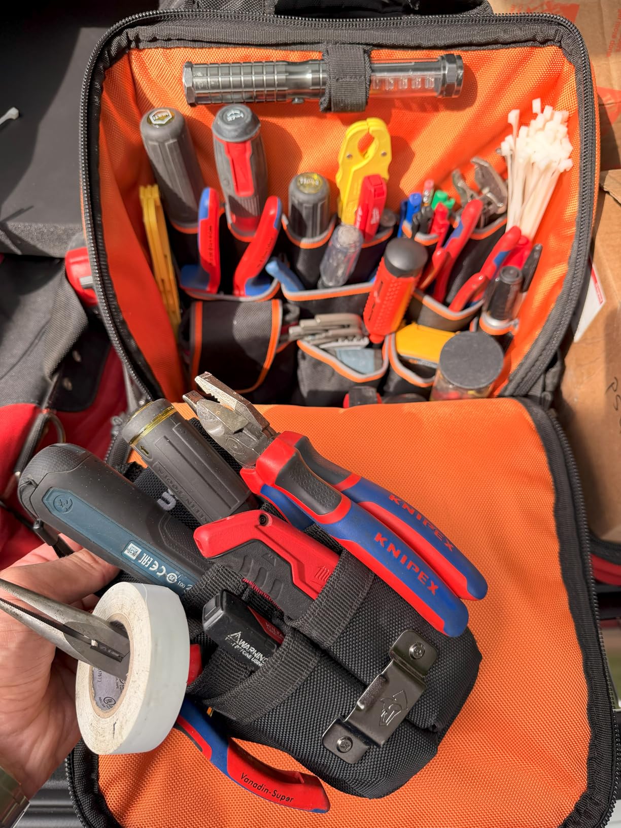 Klein Tools 62482 Tool Backpack, Tool-Station Pro Heavy-Duty Organizer with 27 Pockets, Large Interior, Molded Bottom, Electrician Tool Bag Customer Review Klein Tools 62482 Tool Backpack, Tool-Station Pro Heavy-Duty Organizer with 27 Pockets, Large Interior, Molded Bottom, Electrician Tool Bag - Customer Photo 2