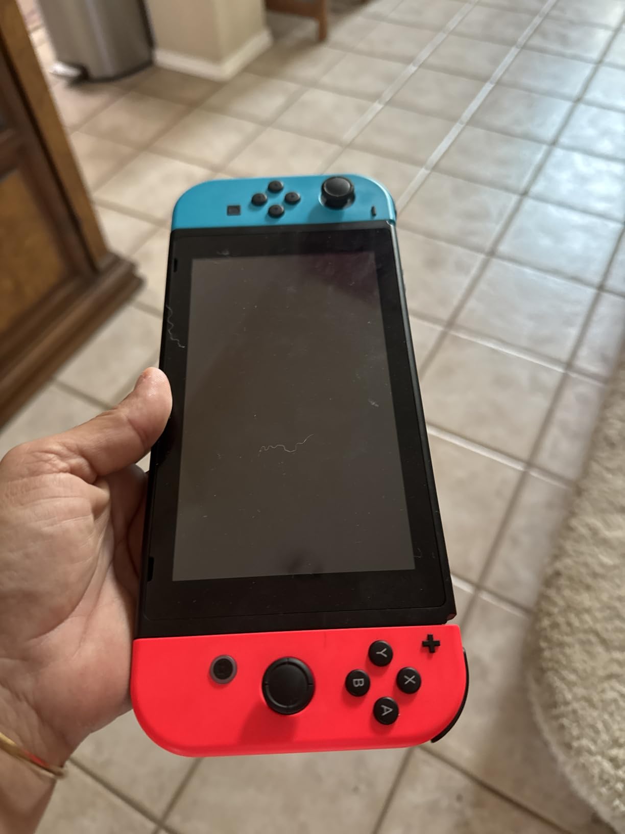 Nintendo Switch with Neon Blue and Neon Red Joy‑Con Customer Review Nintendo Switch with Neon Blue and Neon Red Joy‑Con - Customer Photo 1