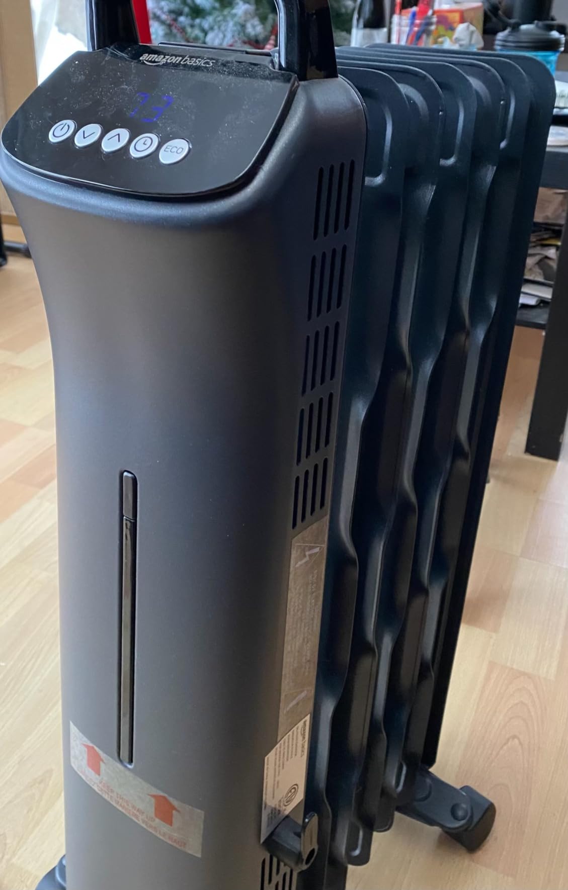 Amazon Basics Oil Space Heater, Portable Radiator Heater with 7 Oil-Filled Fins for Indoor Use, 3 Heat Settings, Thermostat, Tip-Over Protection, ETL Safety Certificate, Manual Control, 1500W, Black - Customer Photo 3