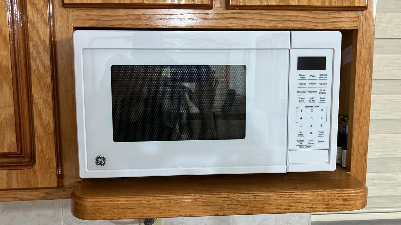 GE Countertop Microwave Oven, Compact 0.9 Cubic Ft., 900-watt Capacity, 7 Auto Cooking Settings, Child-Lock Technology, Kitchen Essentials for the Countertop, Dorm Room or Apartment, Stainless Steel - Customer Photo 1