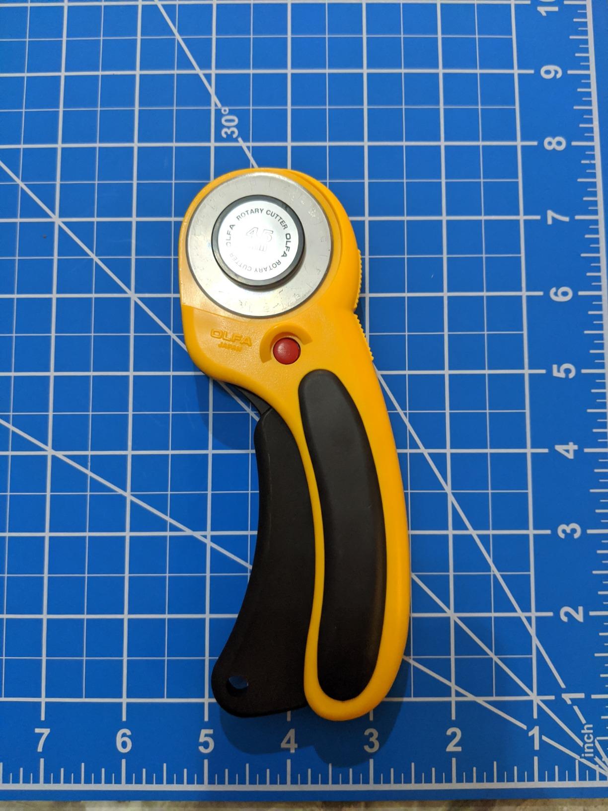 OLFA 45mm Ergonomic Rotary Cutter (RTY-2/DX) - Rotary Fabric Cutter w/Blade Cover & Squeeze Trigger for Quilting, Sewing, Crafts, Replacement Blade: OLFA RB45-1H customer photo 1