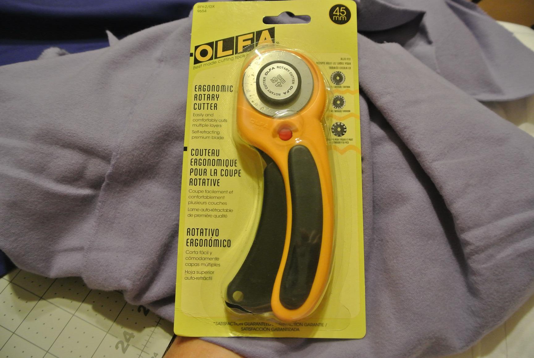 OLFA 45mm Ergonomic Rotary Cutter (RTY-2/DX) - Rotary Fabric Cutter w/Blade Cover & Squeeze Trigger for Quilting, Sewing, Crafts, Replacement Blade: OLFA RB45-1H customer photo 2